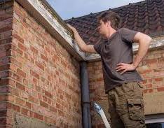 man doing Roof Inspection